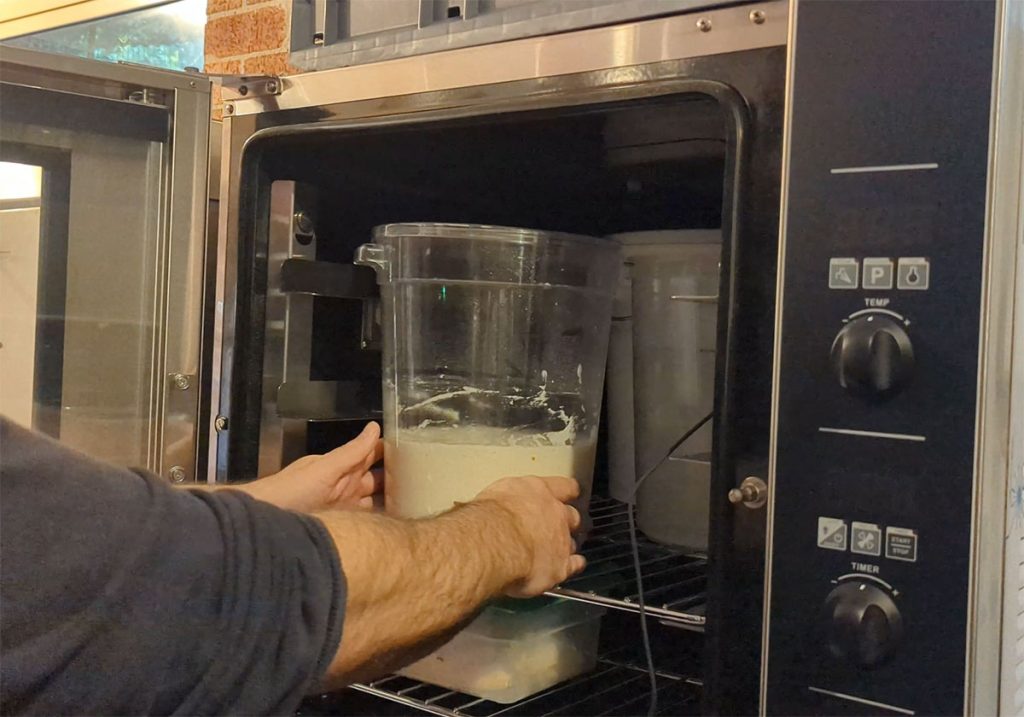 Checking sourdough ingredients temperature before mixing